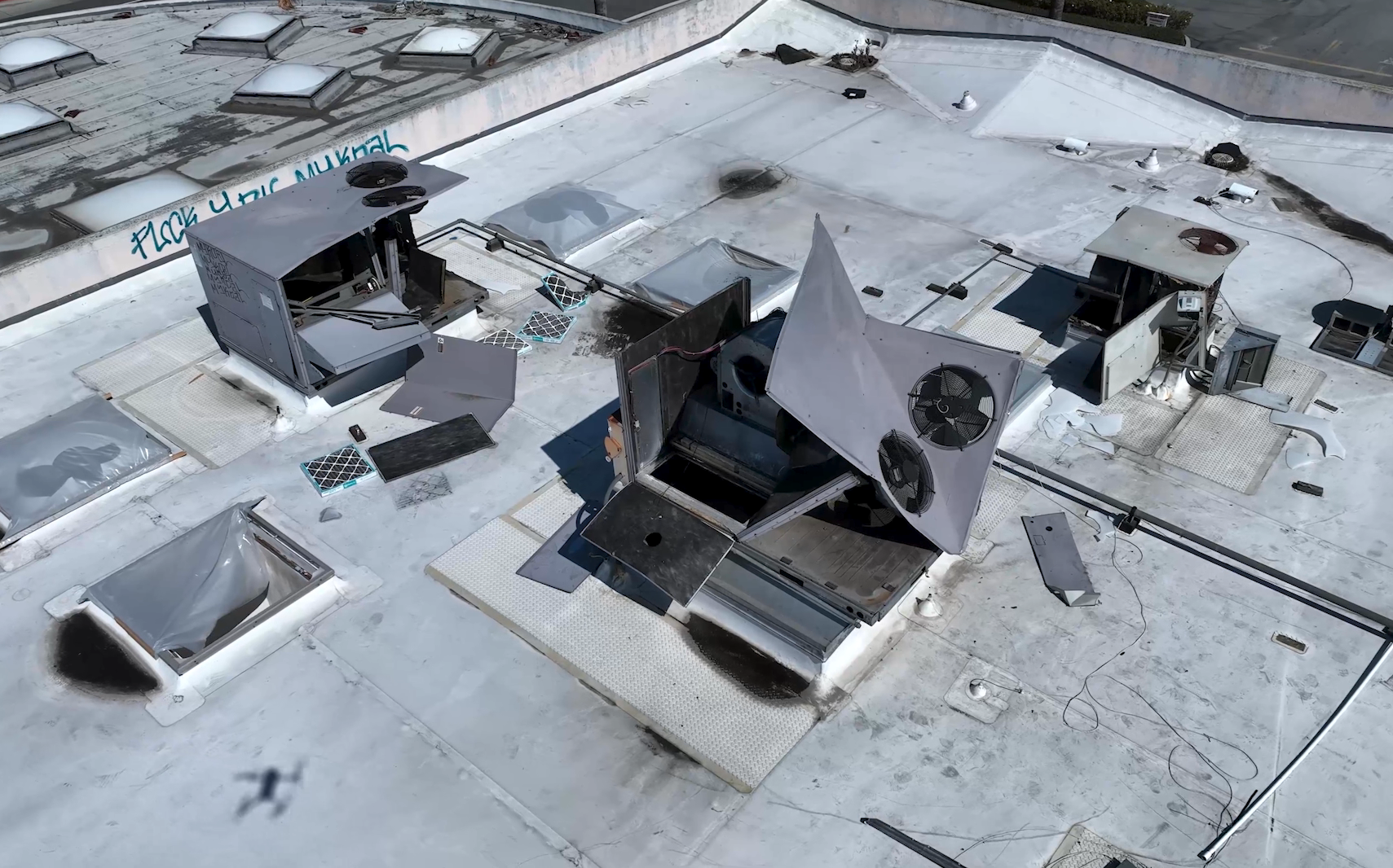 close of damage done to HVAC equipment on top of a building close of damage done to HVAC equipment on top of a building