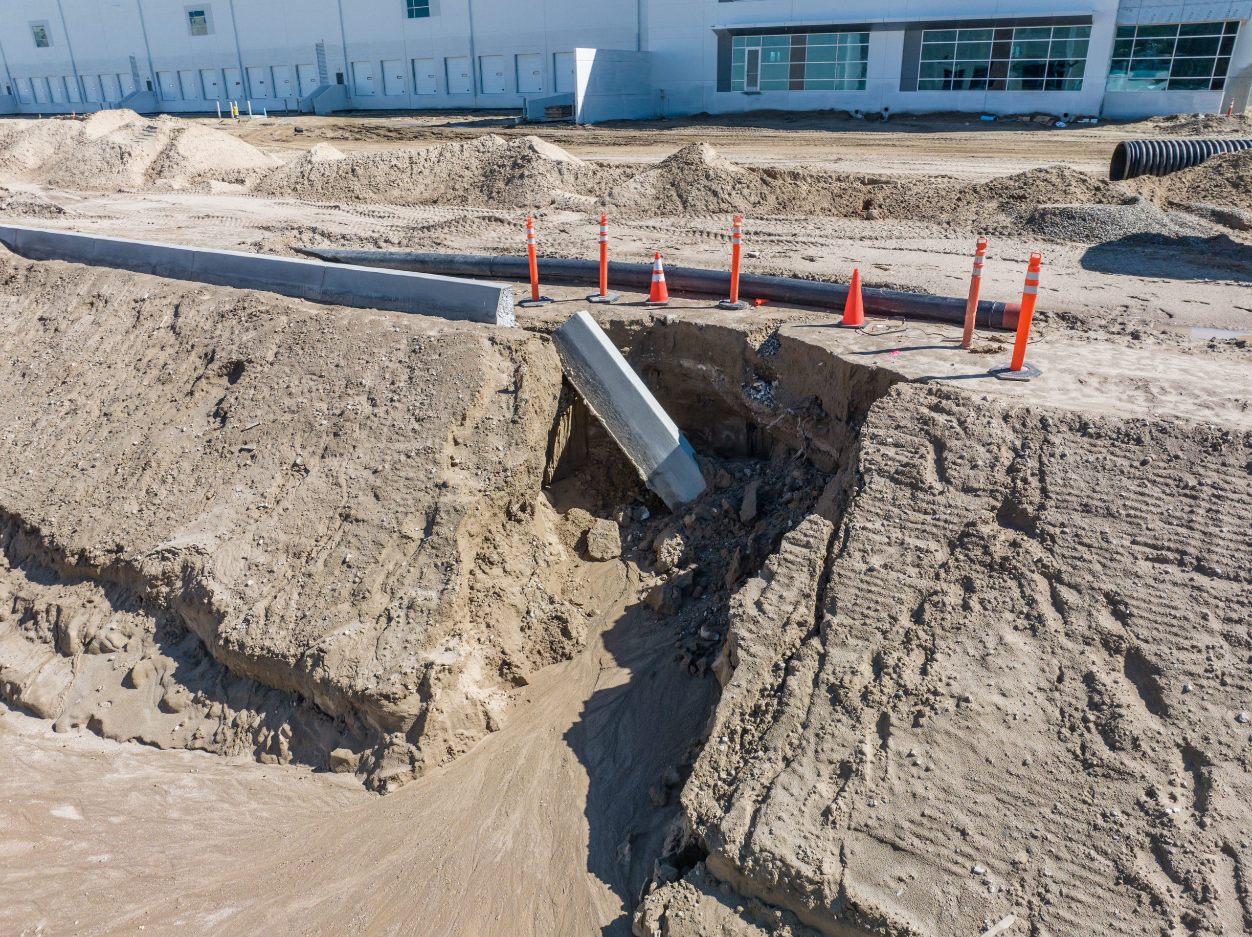 water damage to a parking curb caused by heavy rain