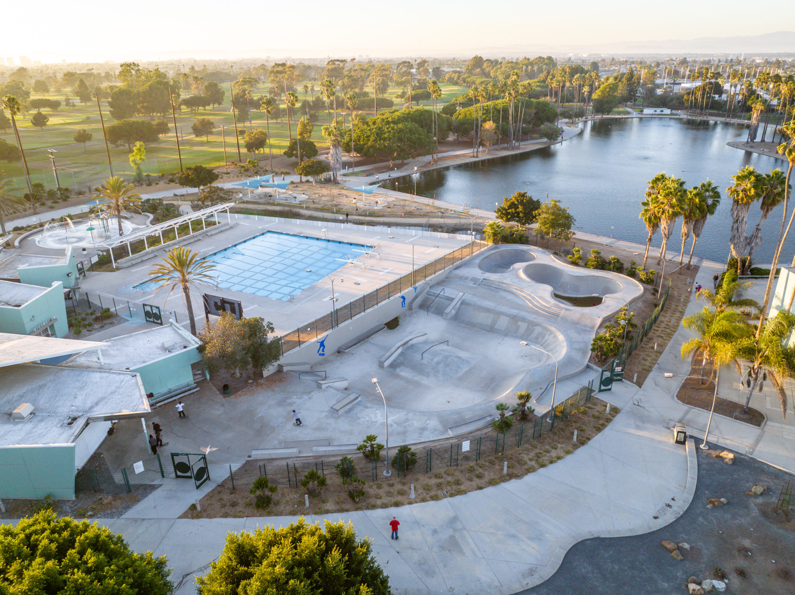 DJI_0038 Alondra Park Splash Pad. Outdoor public playground with swings, climbing equipment & a kid-friendly fountain.